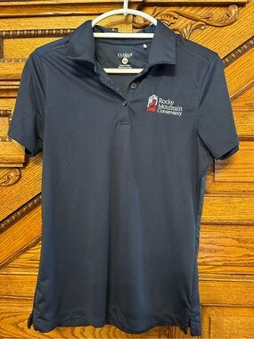 Clique Rocky Mountain Conservancy Embroidered Performance Polo Shirt Women’s Med